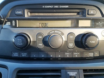 enter dodge caliber radio code